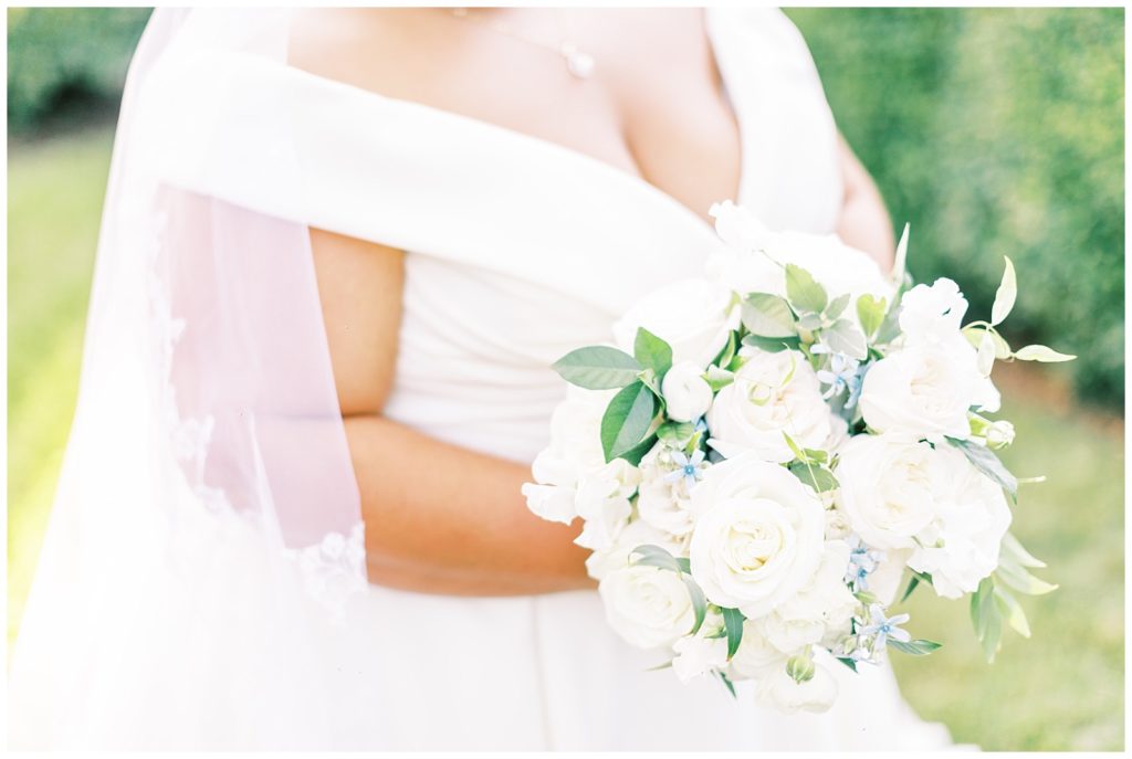 Close up image of classic white roses for Amanda's bridal portraits.