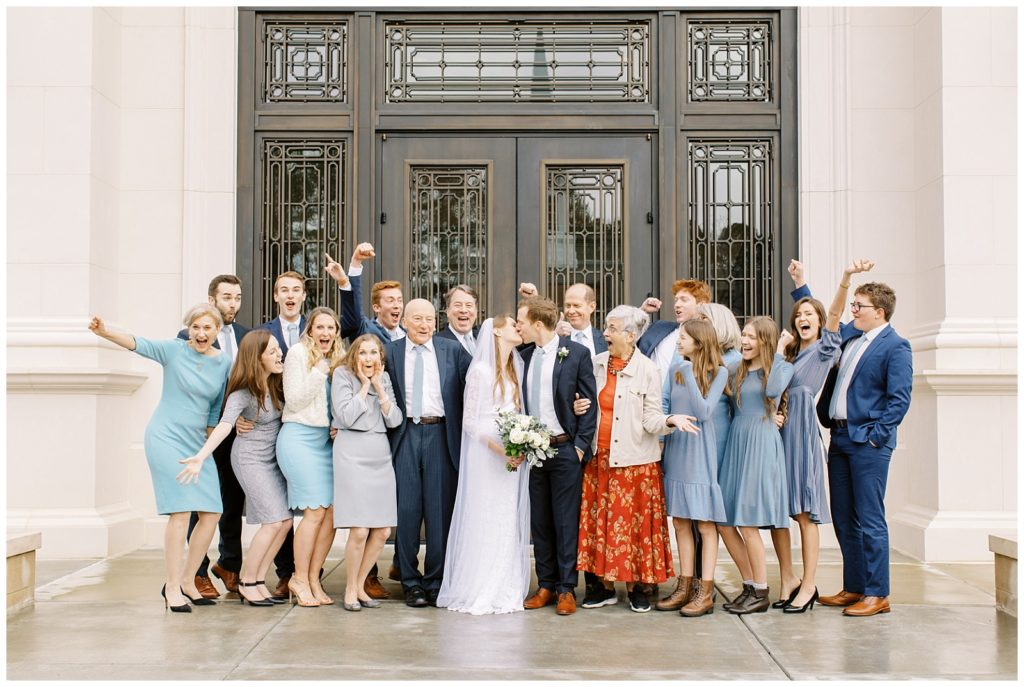 Bride and groom with all their wedding guests at the Raleigh Temple in North Carolina