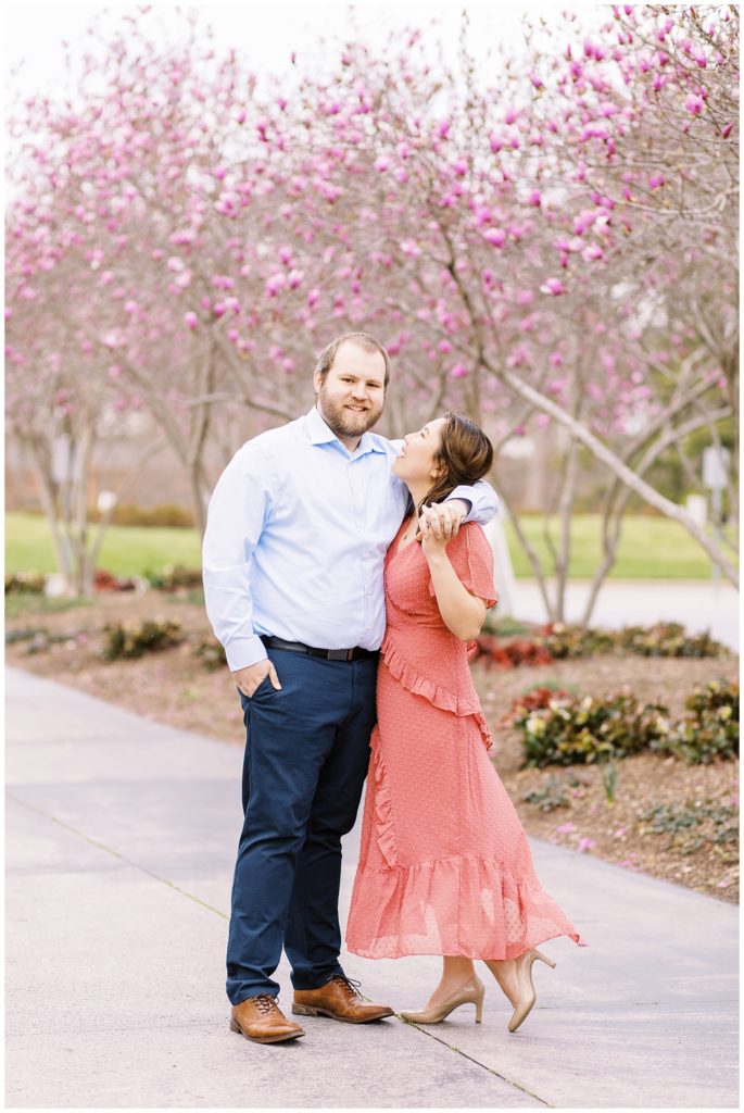 Spring engagement session with pink flowers in Raleigh, NC