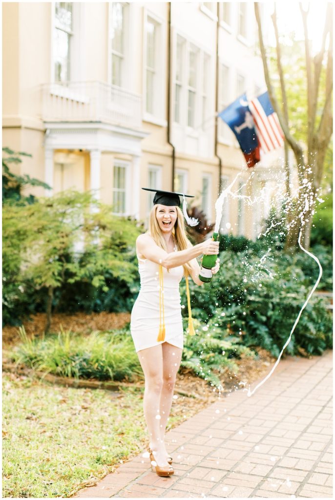 University of South Carolina champagne pop grad photo on the horseshoe 