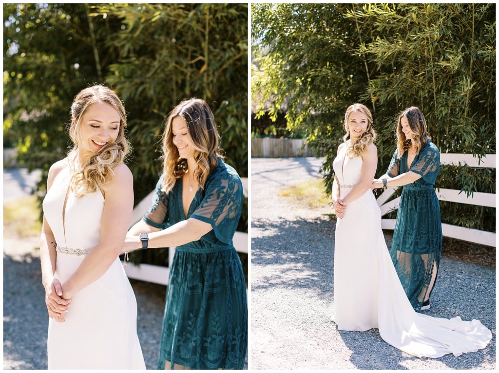 The bride's friend and wedding coordinator helped her get dressed the day of the wedding.