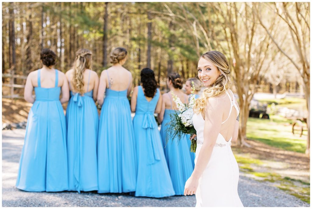 Delaney looking over her shoulder before her first look with her bridesmaids.