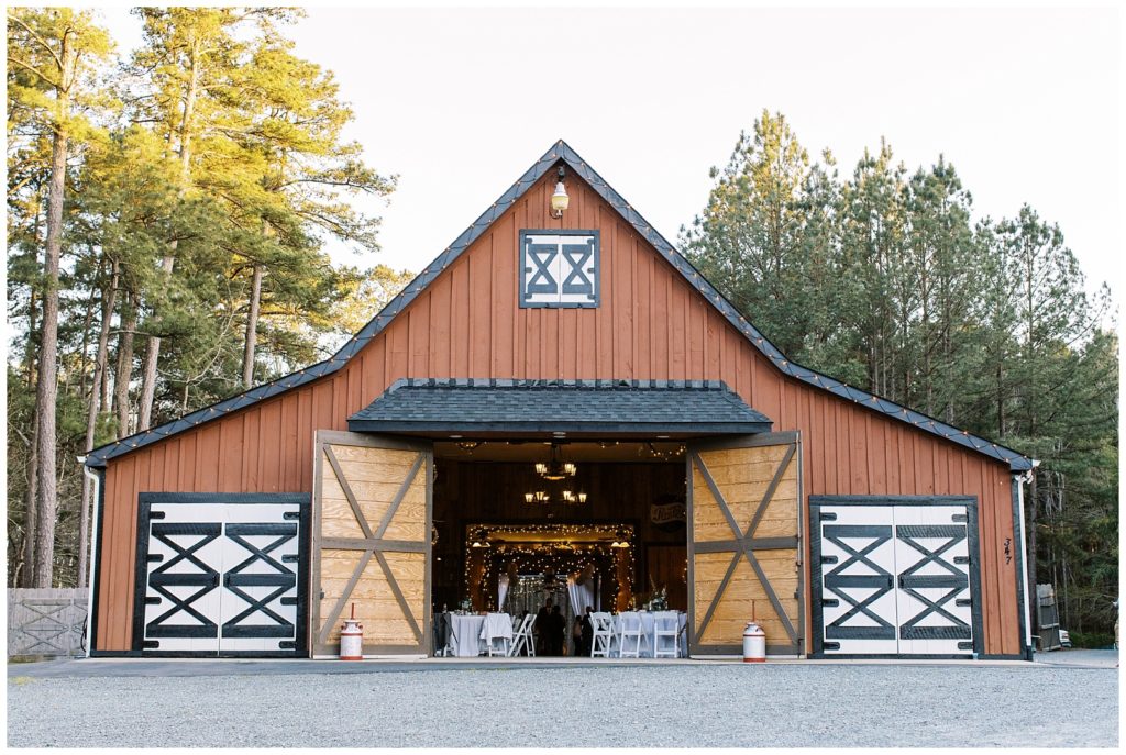 The barn doors open for the reception dinner at Shady Wagon Farm.