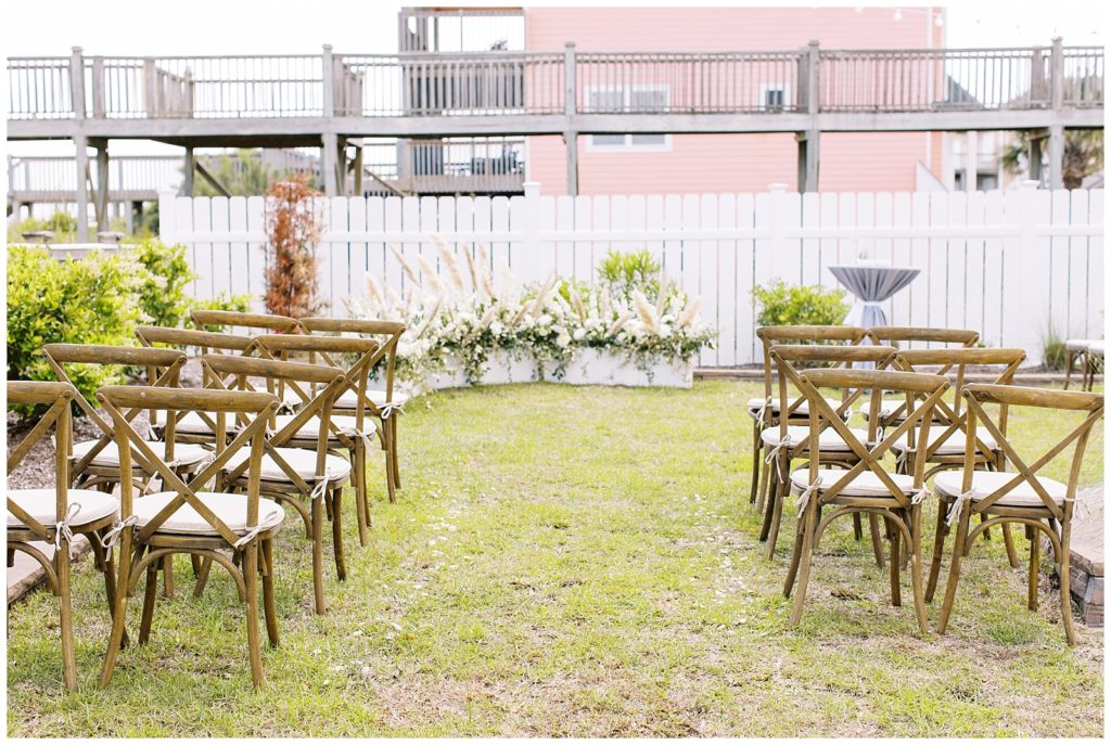 Ceremony decor for a backyard beach wedding in the Outer Banks.