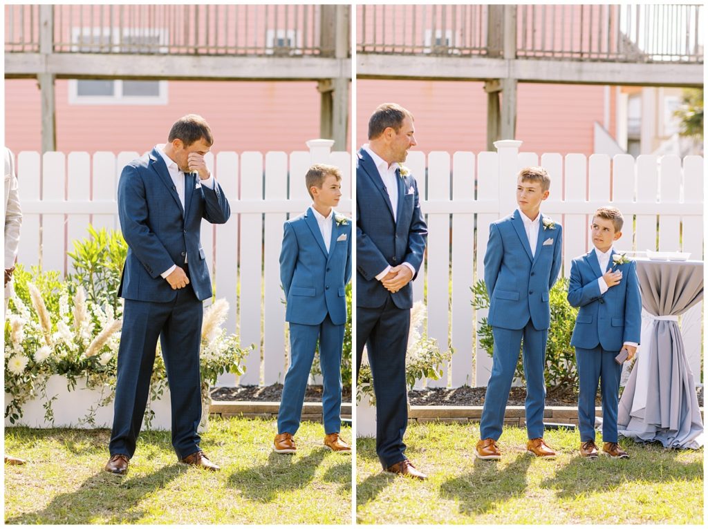 The groom sheds a tear as he sees his bride for the first time, and his son motions to him to use his pocket square.