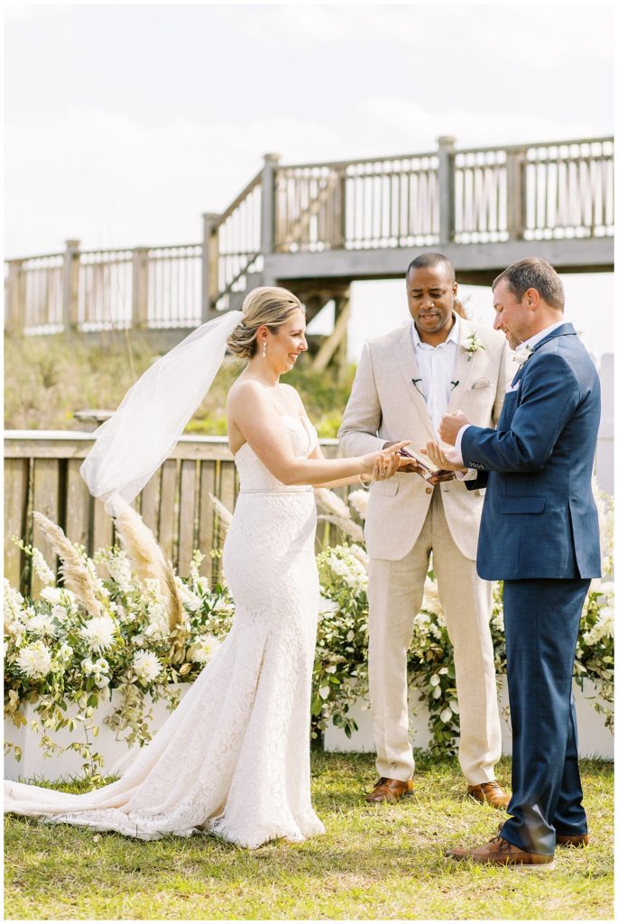 The bride and groom played rock paper scissors to see who would share vows first.