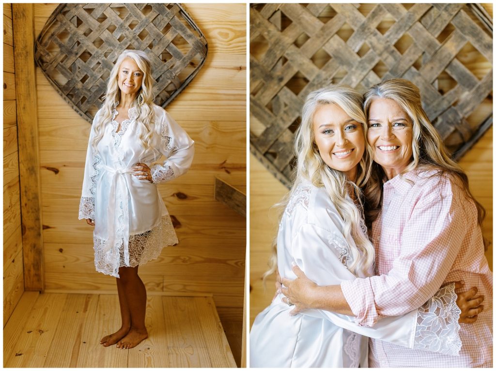 The bride and her mom together wearing her bridal robe.