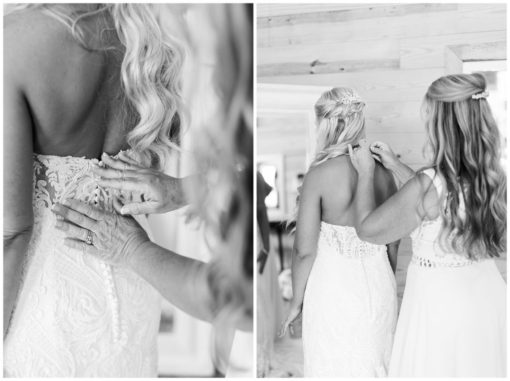 Black and white images of the mother of the bride buttoning her dress and putting on her pearls.