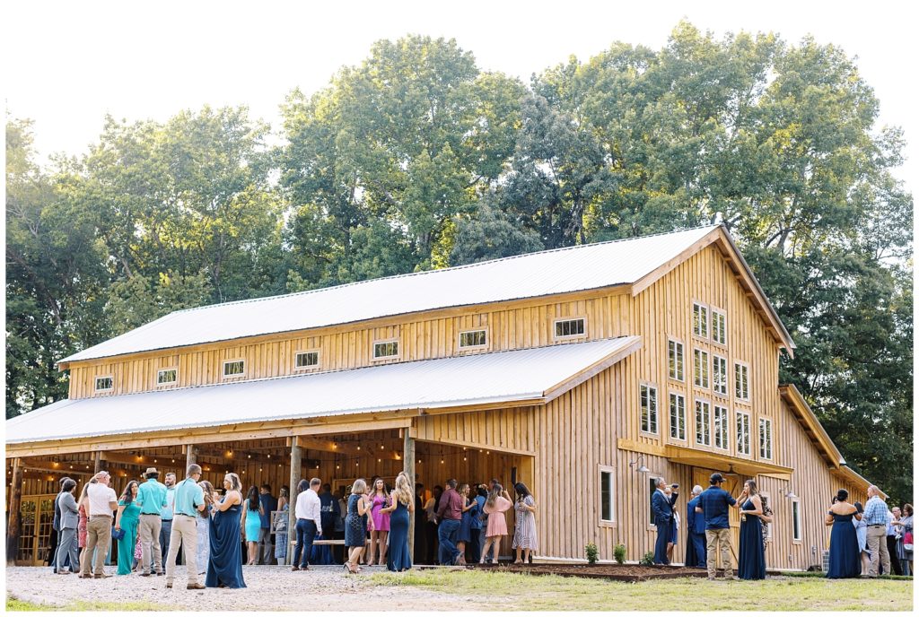 The barn has an outdoor patio to host guests for cocktail hour.