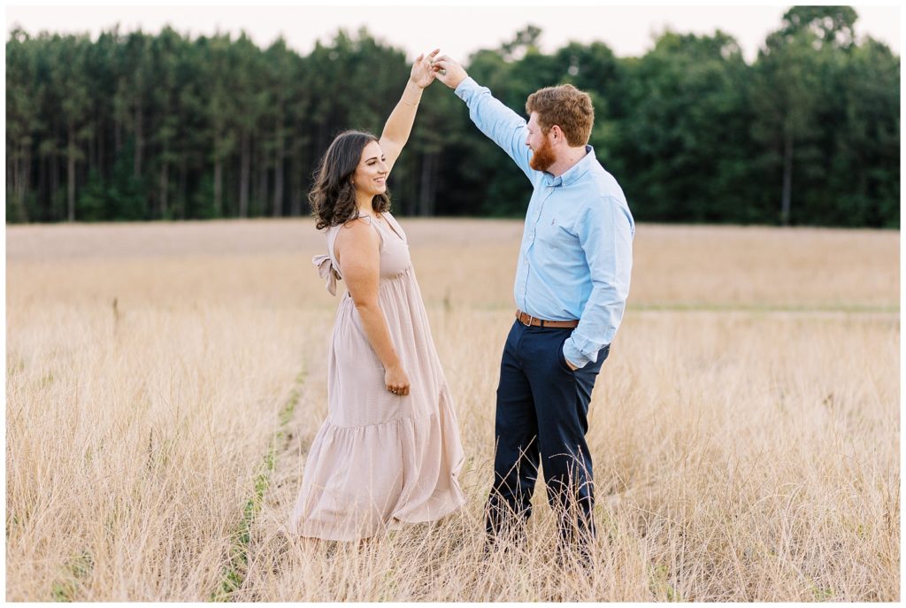 Sunset summer engagement photos in a wheat field outside Raleigh, NC.