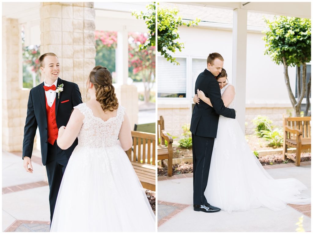 The groom sees his bride for the first time and gives her a hug.