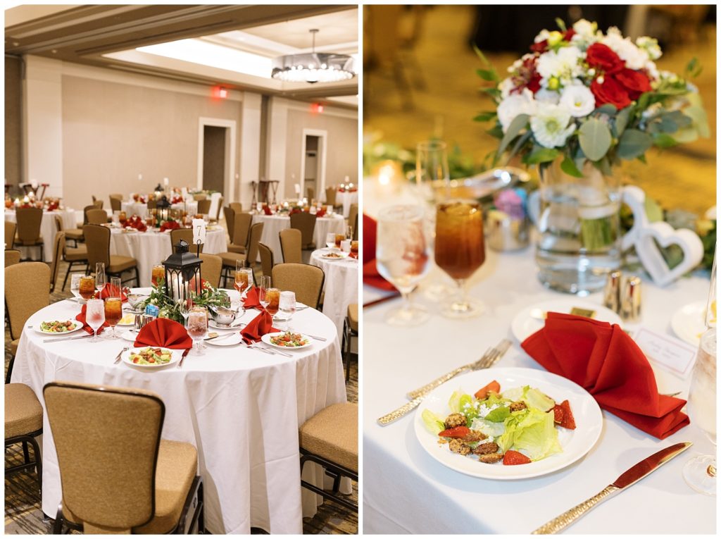 The banquet hall was decorated with red and white florals and candles.