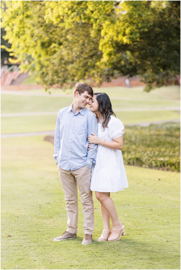 Romantic fall engagement photos at NC state university in Raleigh.