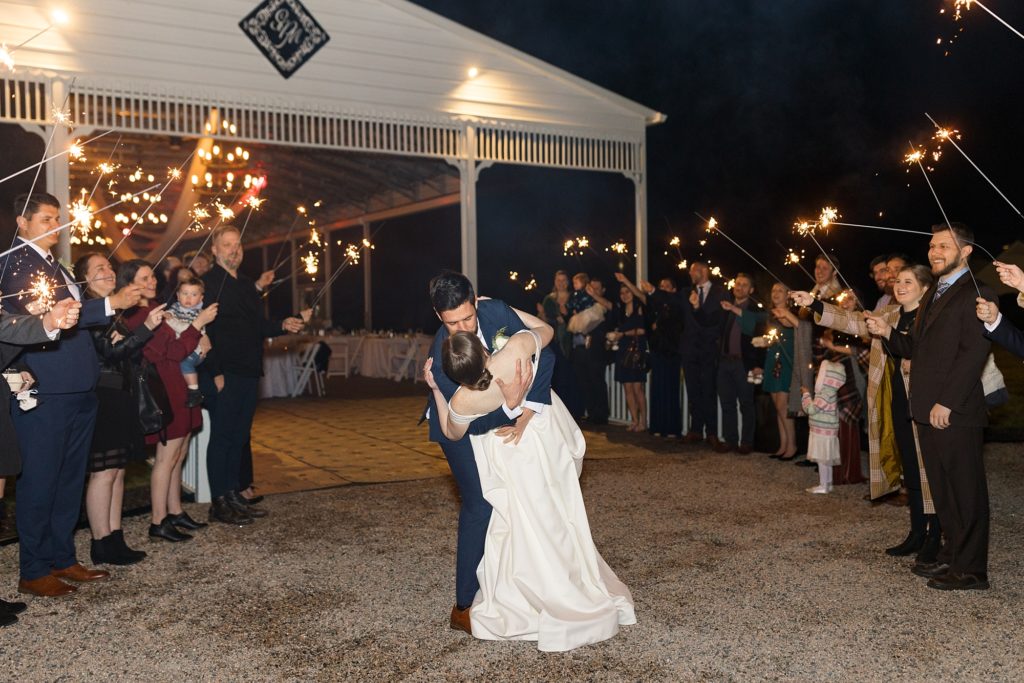 The bride and groom exit their reception with a sparkler exit | Raleigh Wedding Photographer