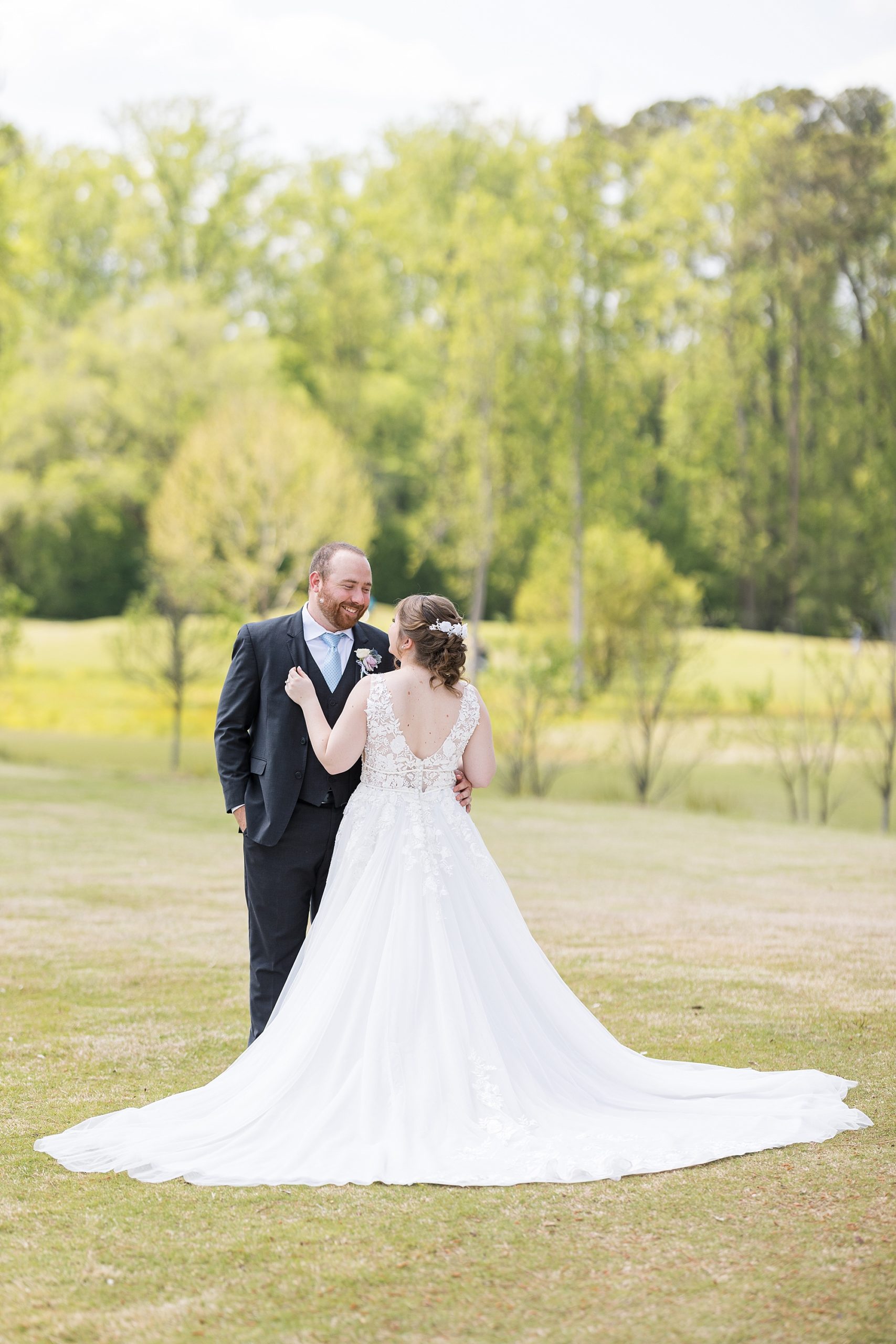 Bride and groom on 12 oaks golf course - Raleigh NC Wedding Photographer - Sarah Hinckley Photography