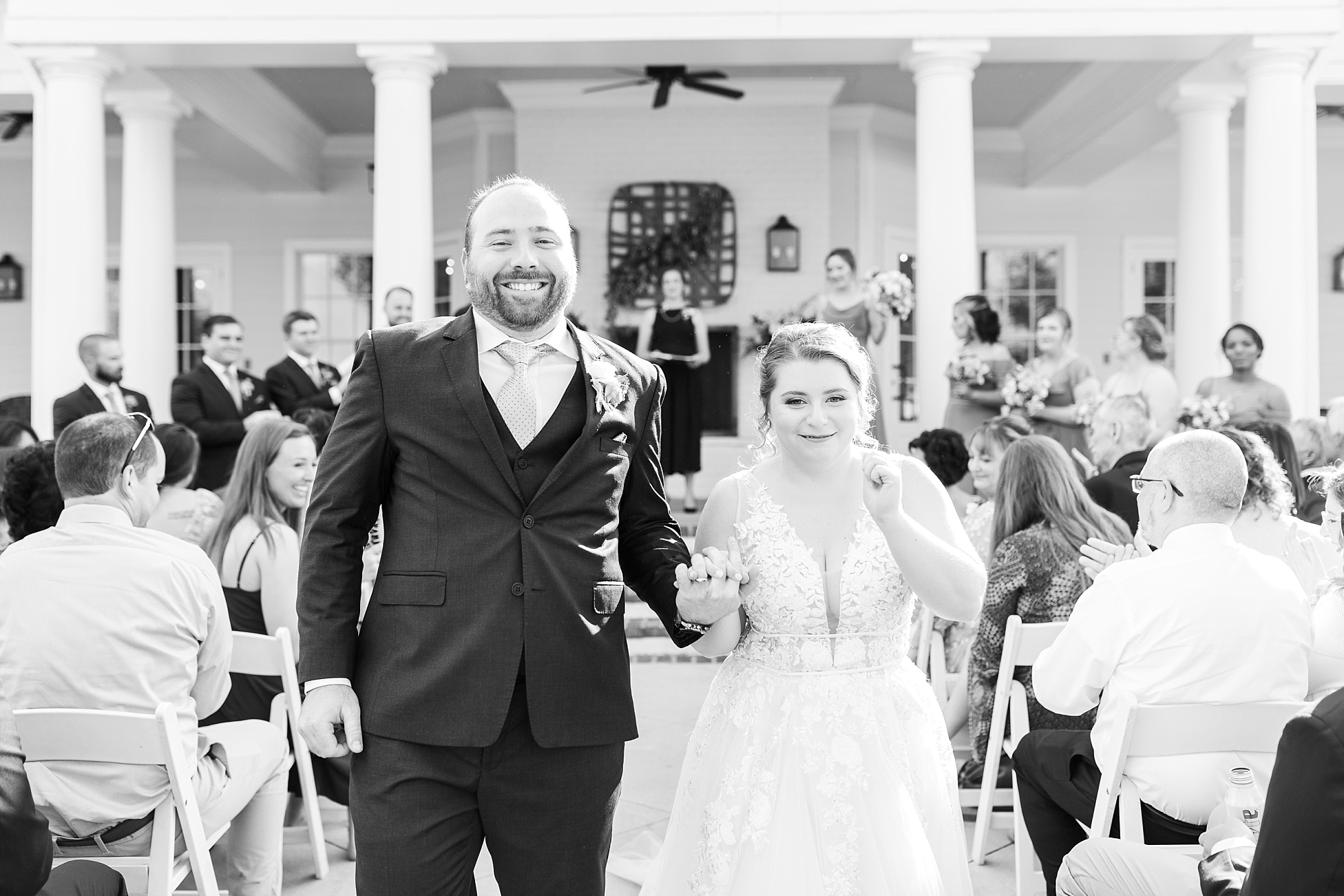 bride and groom walking down the aisle - Raleigh NC Wedding Photographer - Sarah Hinckley Photography