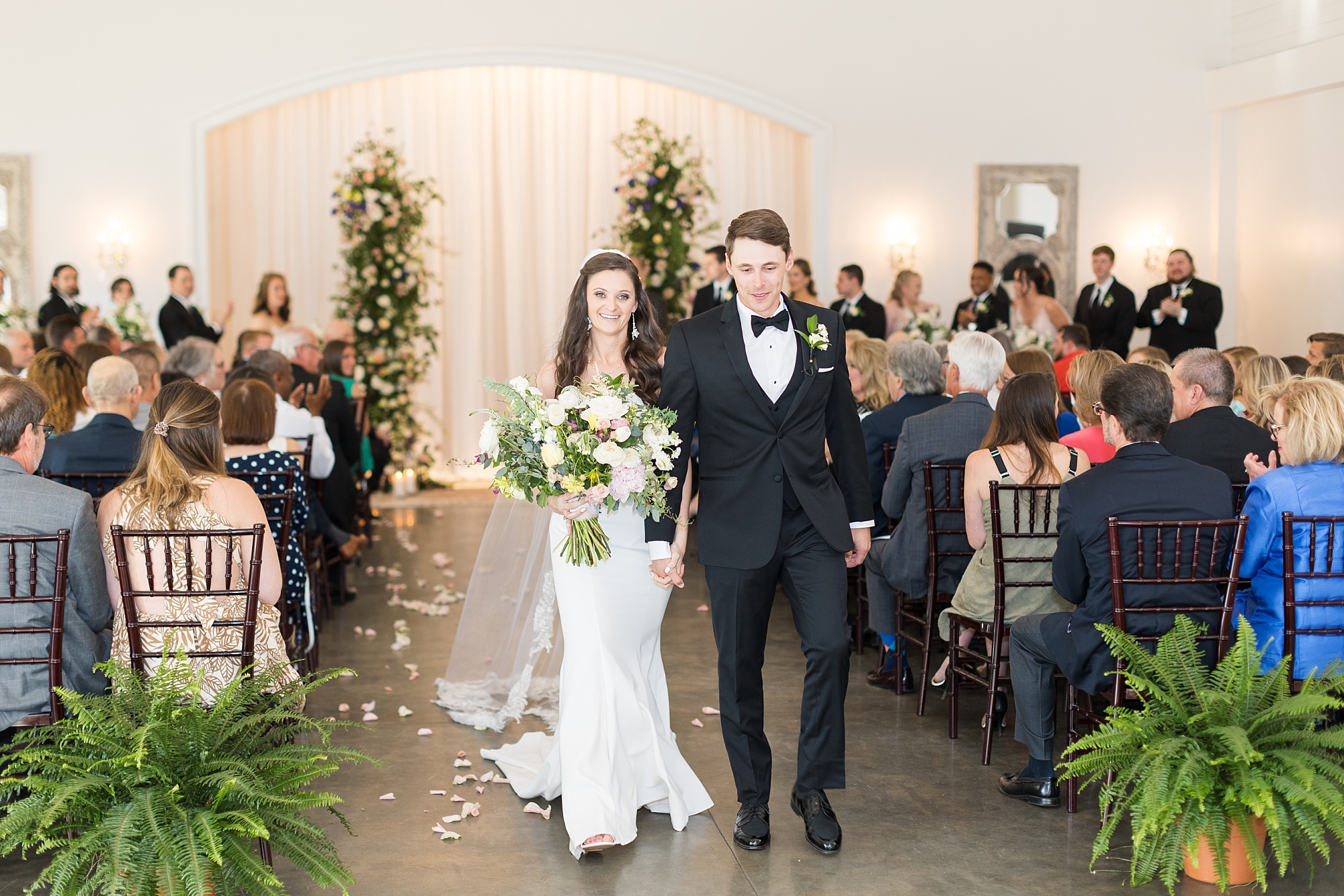 The bride and groom recess down the aisle | Merrimon Wynne Wedding | Sarah Hinckley Photography | Raleigh NC Wedding Photographer