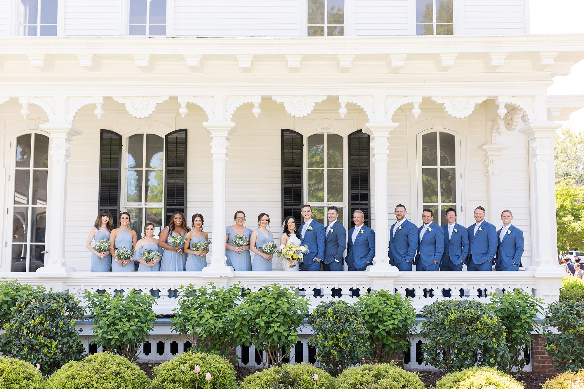 Bridal party of front porch of Merrimon Wynne wedding venue | Raleigh NC Wedding Photographer