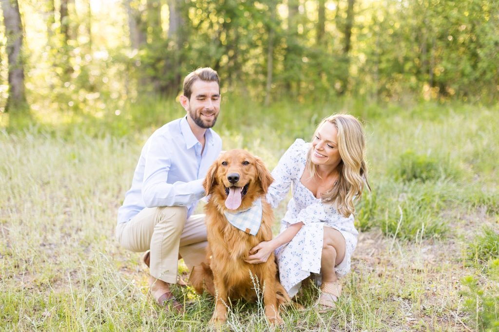 Photo of couple with their golden retriever  | Raleigh NC Wedding Photographer
