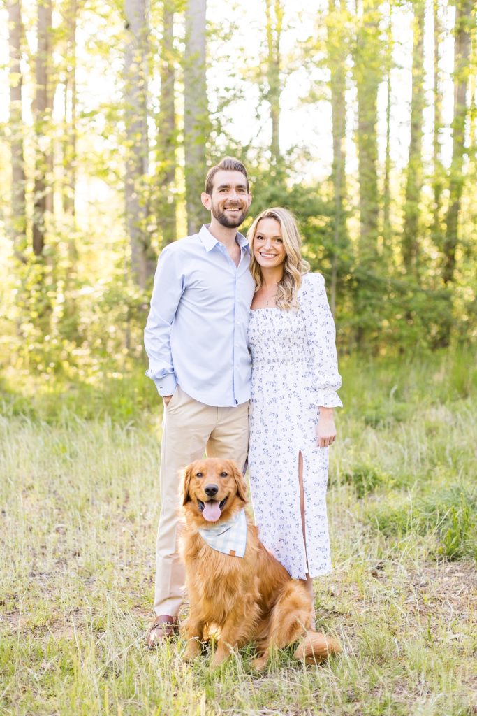 couple with dog for their engagement photos  | Raleigh NC Wedding Photographer