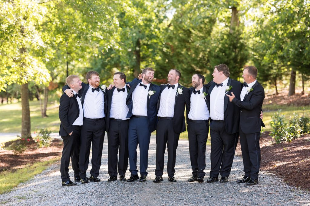 spring wedding groomsmen at Southern Grace Farms | Raleigh NC Wedding photographer