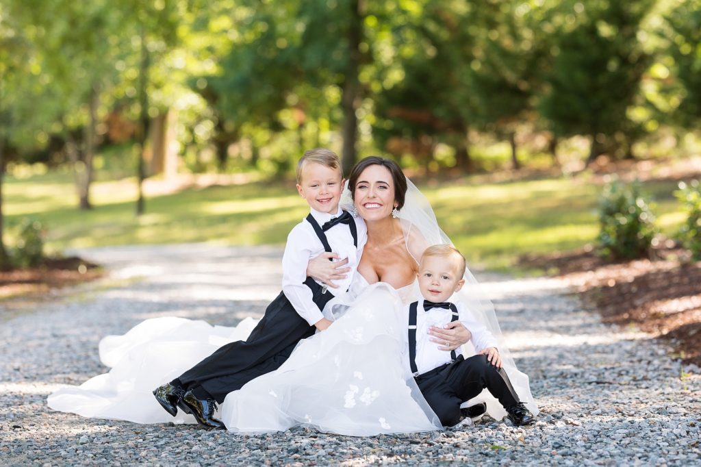 bride with ring bearers in suits | Raleigh NC Wedding photographer