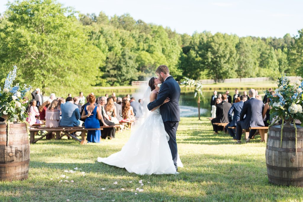 bride and groom kissing  | Raleigh NC Wedding photographer