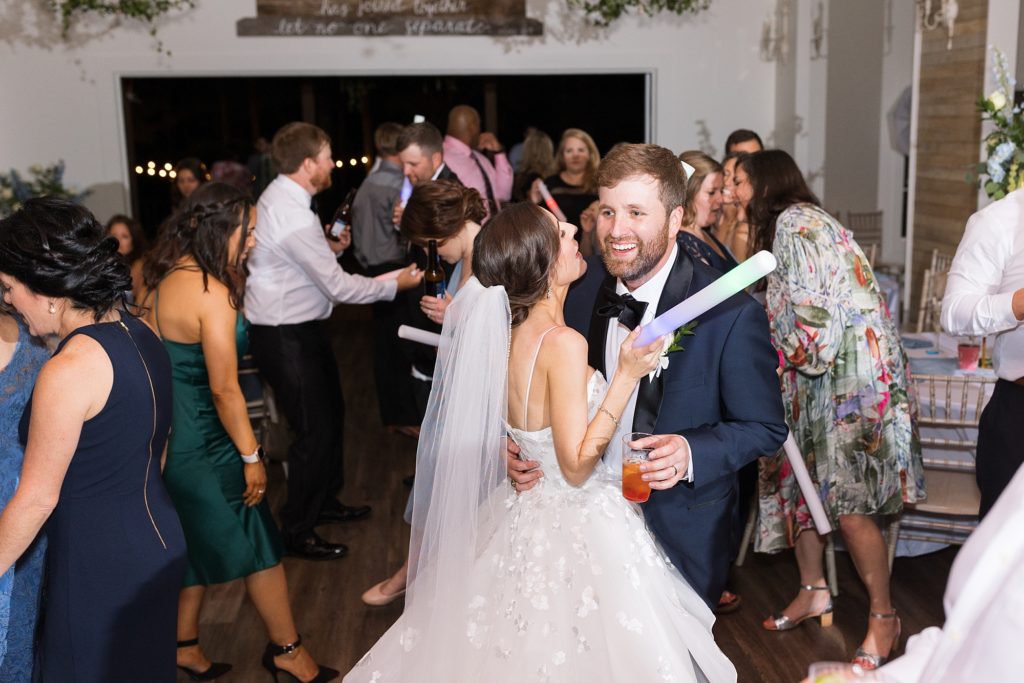 Bride and groom dancing with their guests | Raleigh NC Wedding photographer