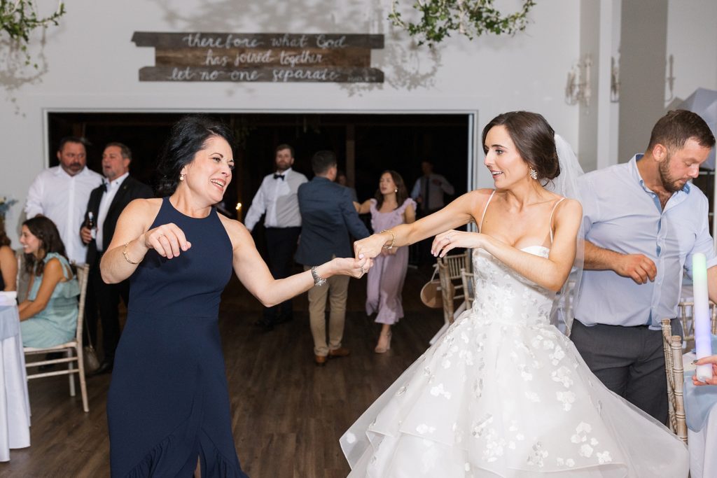 bride dancing with her mom | Raleigh NC Wedding photographer