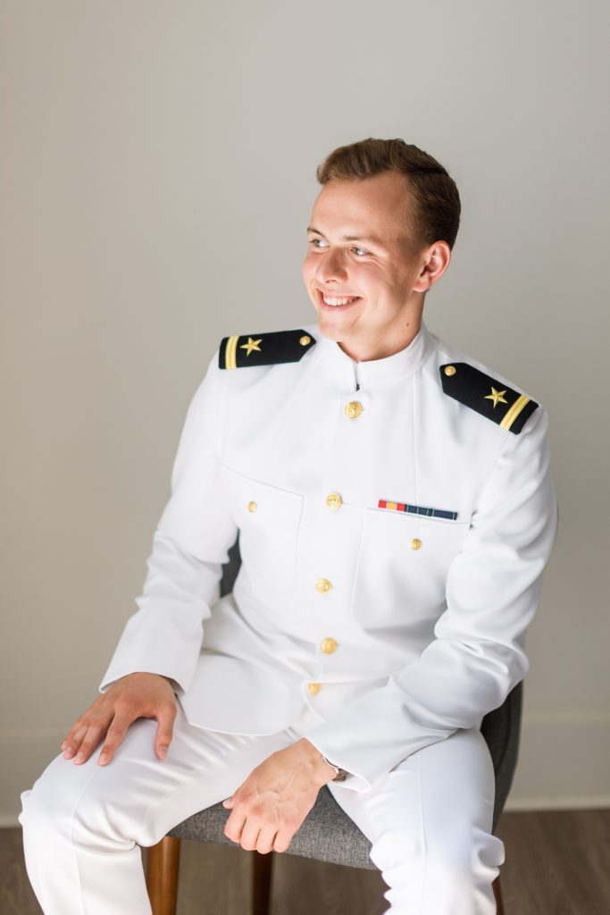 Groom getting ready photos in a white naval uniform  | Carolina Grove | Raleigh NC Wedding Photographer | Sarah Hinckley Photography