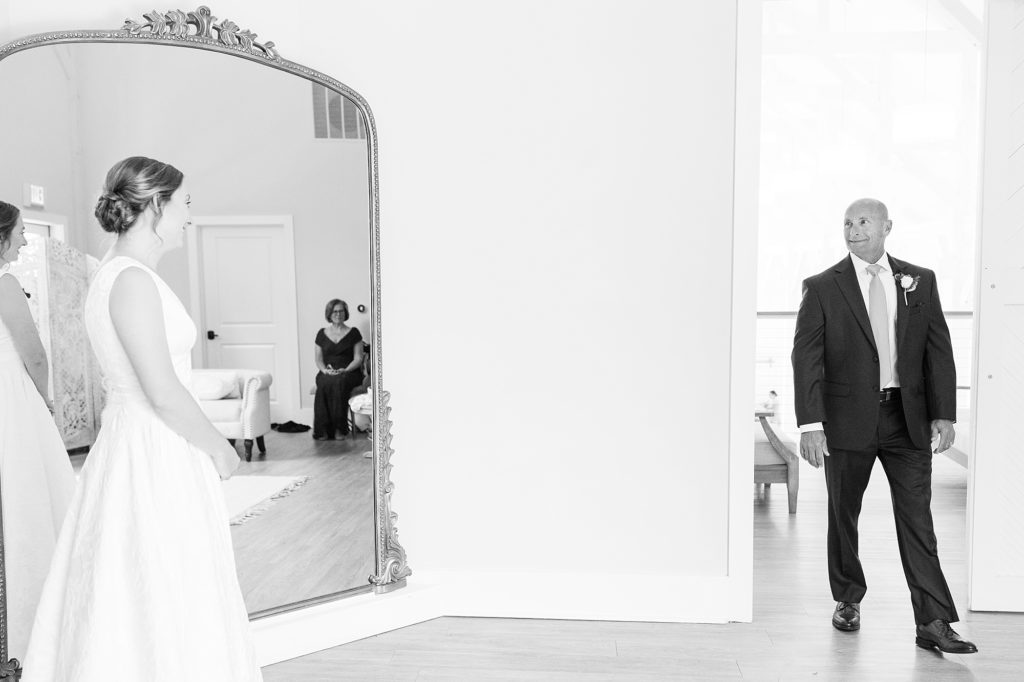 The father of the bride walks in to see his daughter dressed up for the first time  | Carolina Grove | Raleigh NC Wedding Photographer | Sarah Hinckley Photography