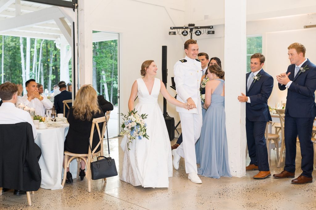 The bride and groom enter their reception together | Carolina Grove | Raleigh NC Wedding Photographer | Sarah Hinckley Photography