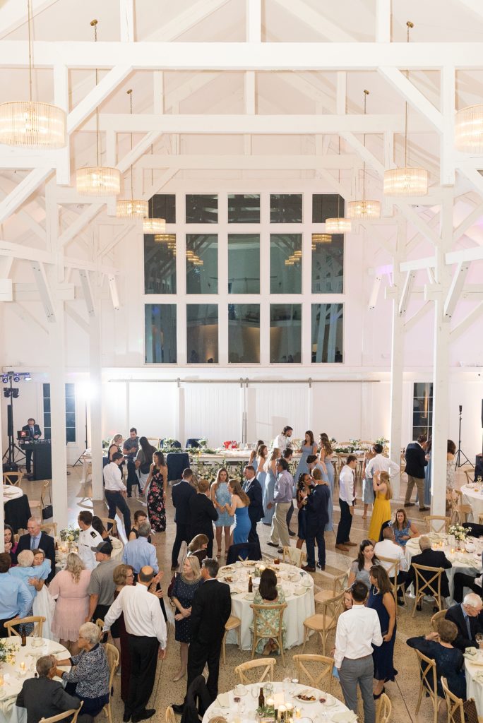 Indoor white barn wedding reception | Carolina Grove | Raleigh NC Wedding Photographer | Sarah Hinckley Photography