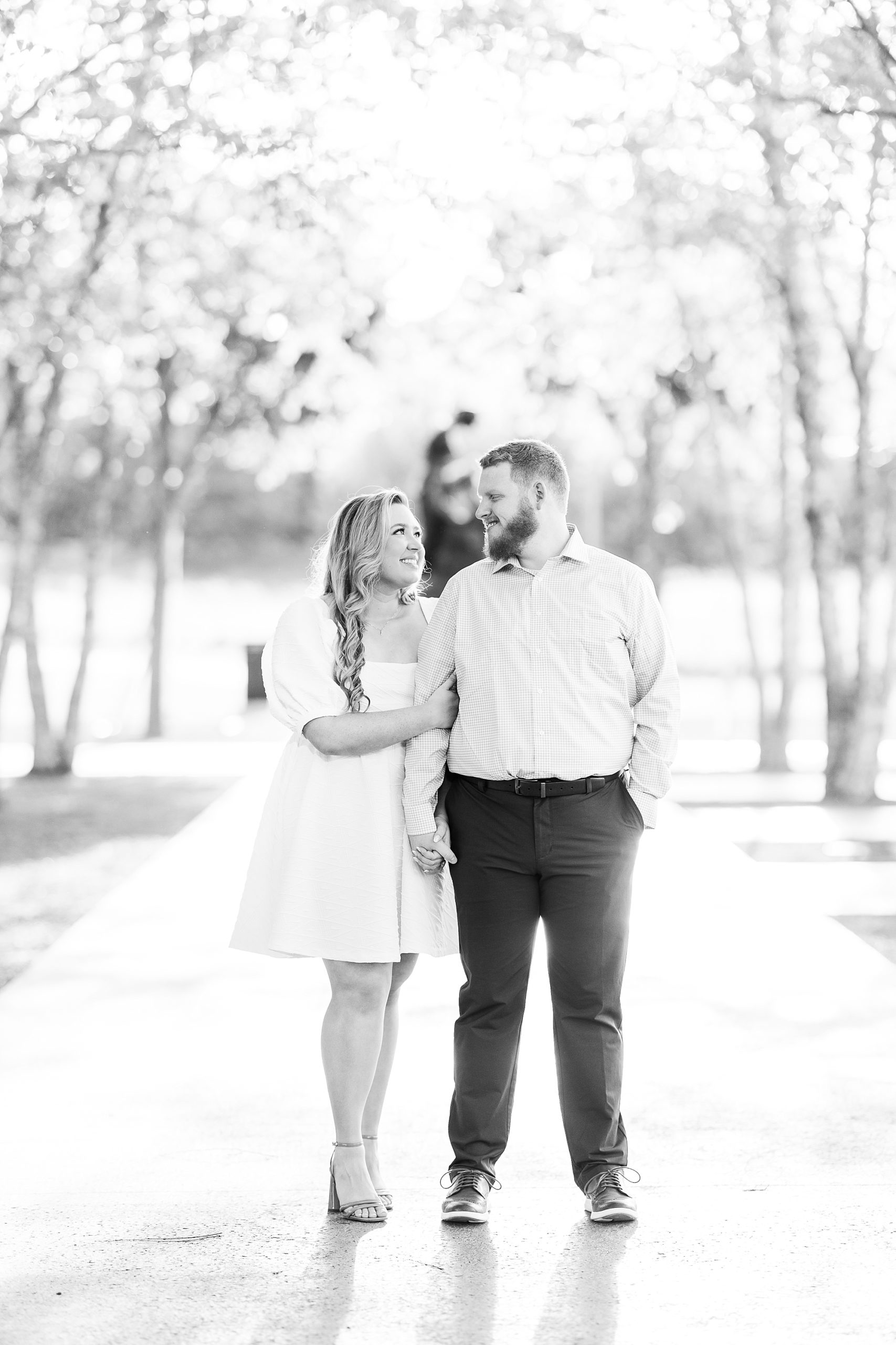 Black and white engagement photos wearing a free people dress | Raleigh NC Engagement Photographer