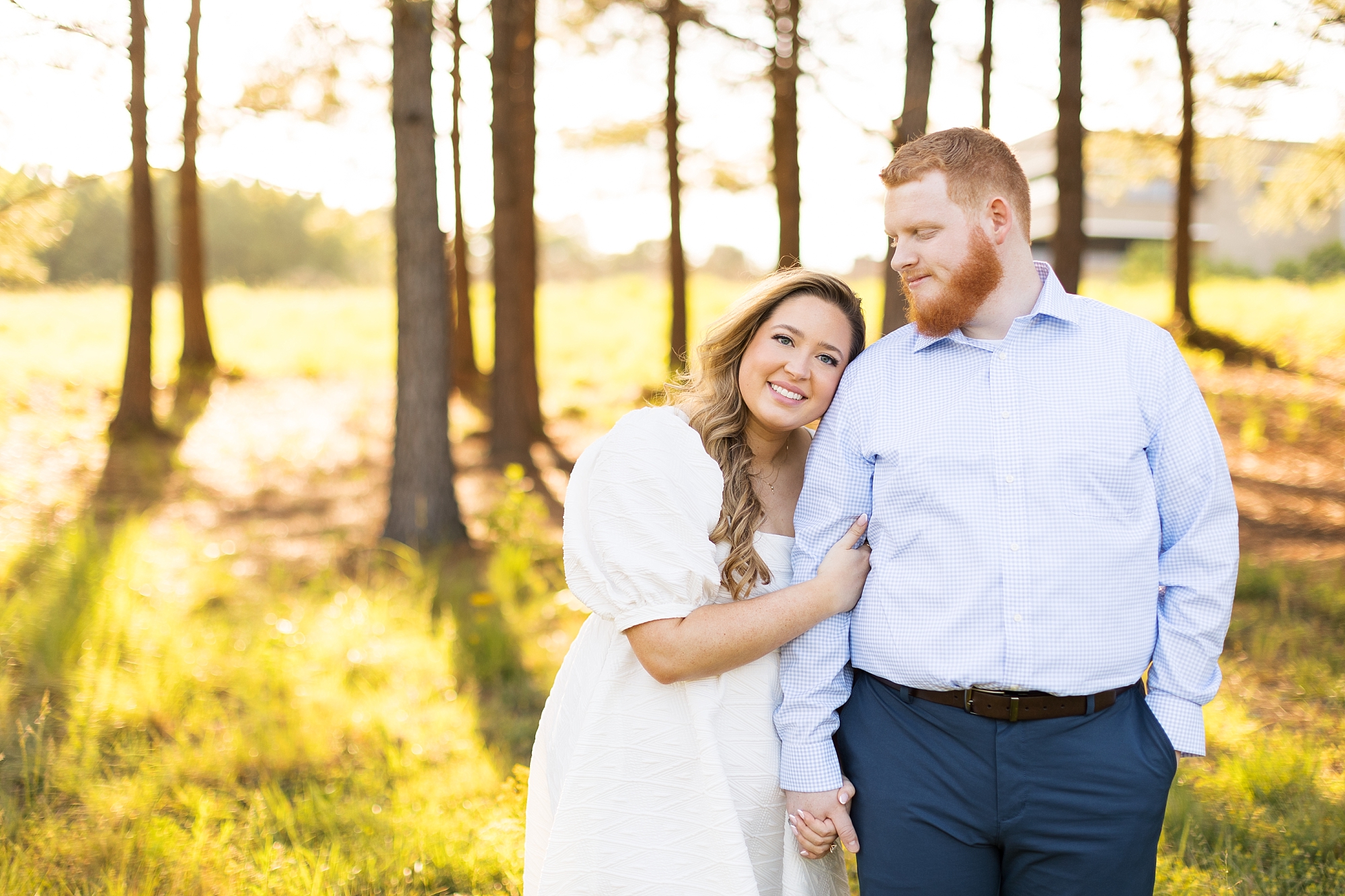 North Carolina Museum of Art engagement photos in a field of tall grass with willow trees | Raleigh NC Engagement Photographer