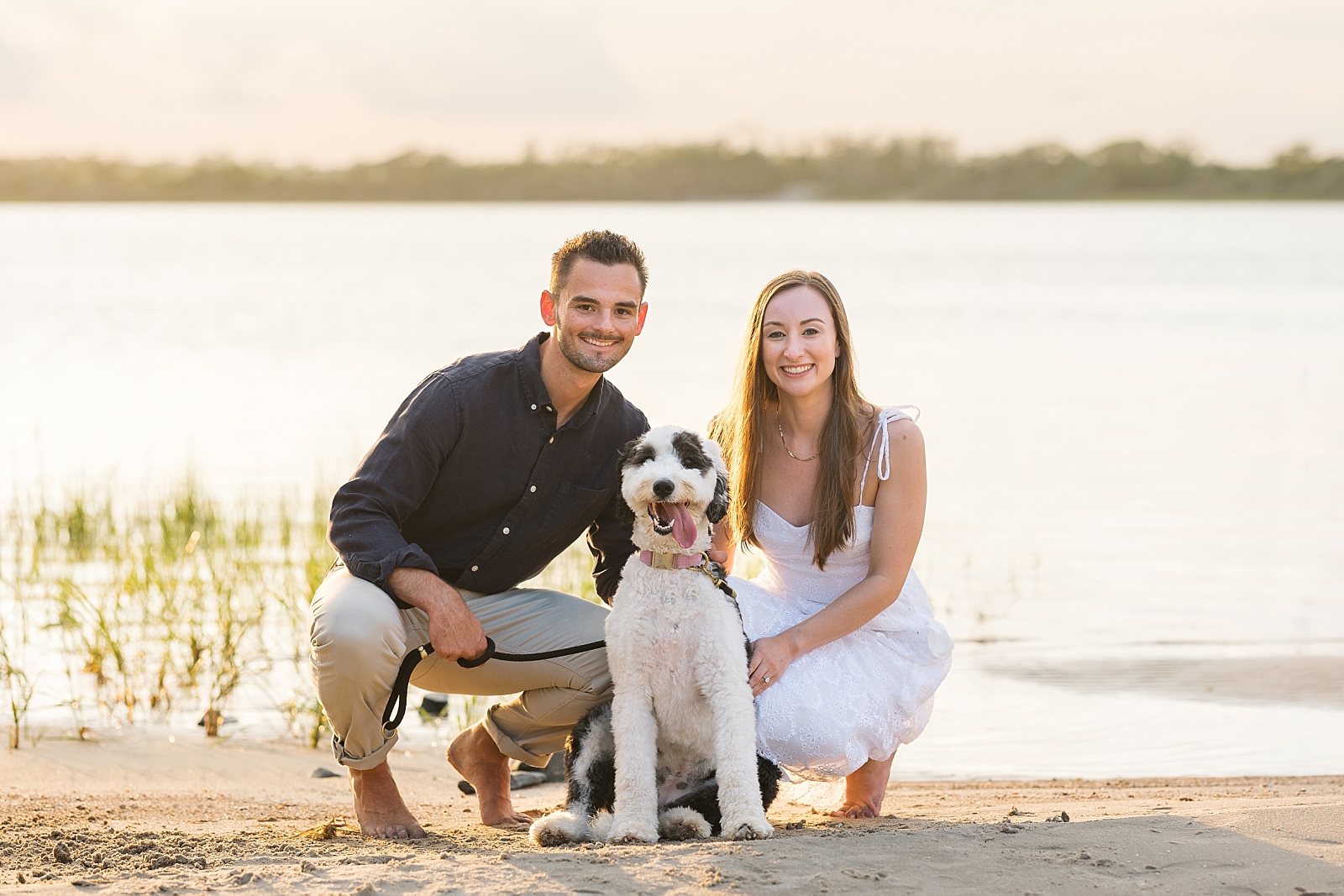Golden hour engagement photos on the beach at Topsail with a dog | Raleigh North Carolina Wedding Photographer