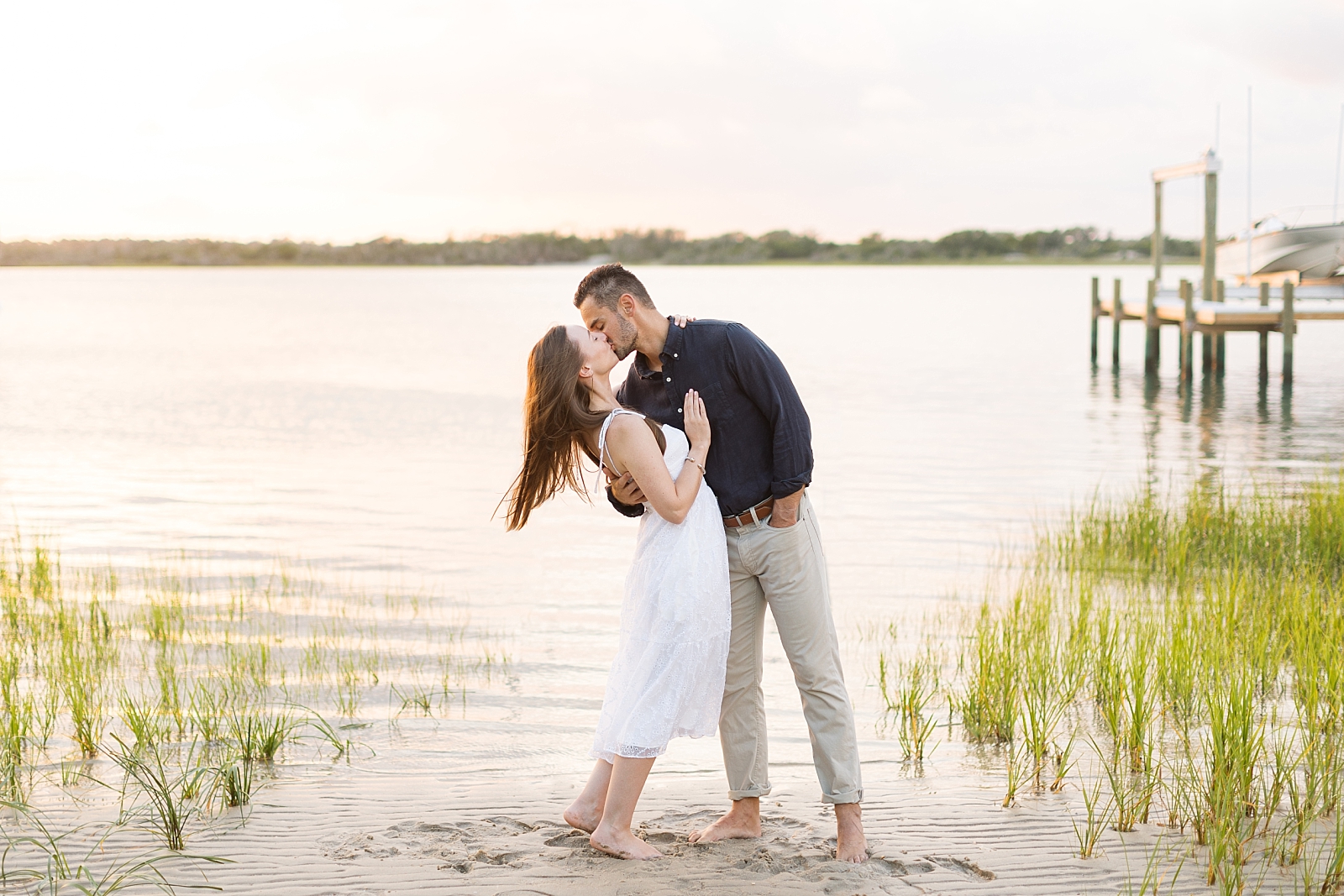 Golden hour sunset engagement photos on the sound at Topsail | Raleigh North Carolina Wedding Photographer