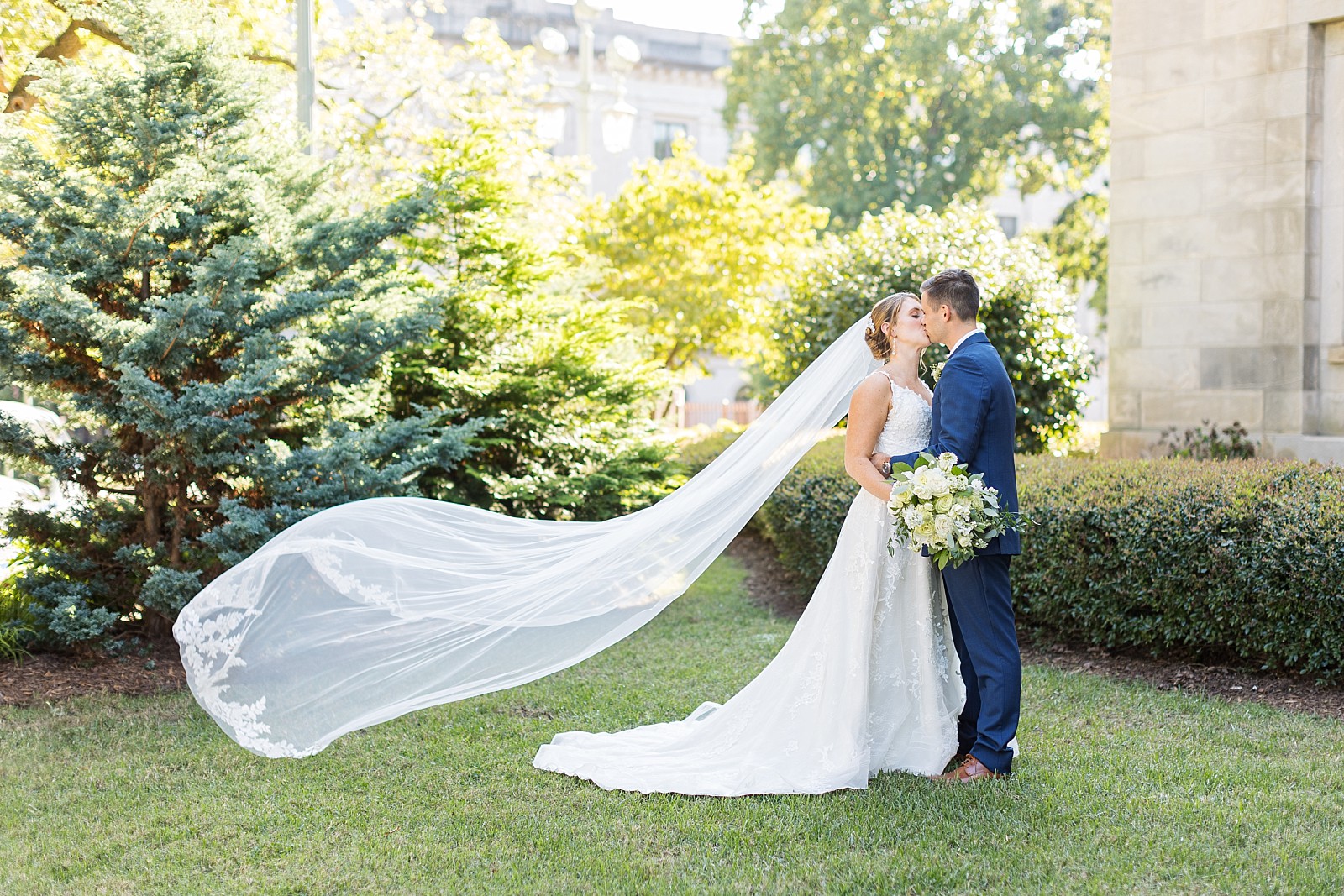 Bride's veil blowing in the wind | Raleigh Wedding Photographer Sarah Hinckley