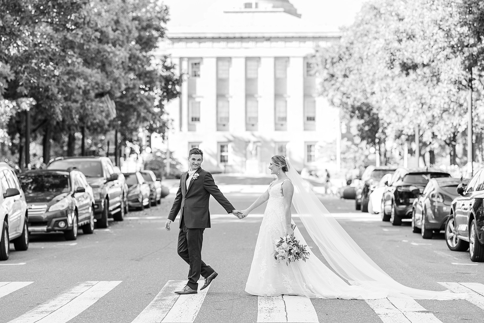 Bride and groom crossing the street | Raleigh Wedding Photographer Sarah Hinckley