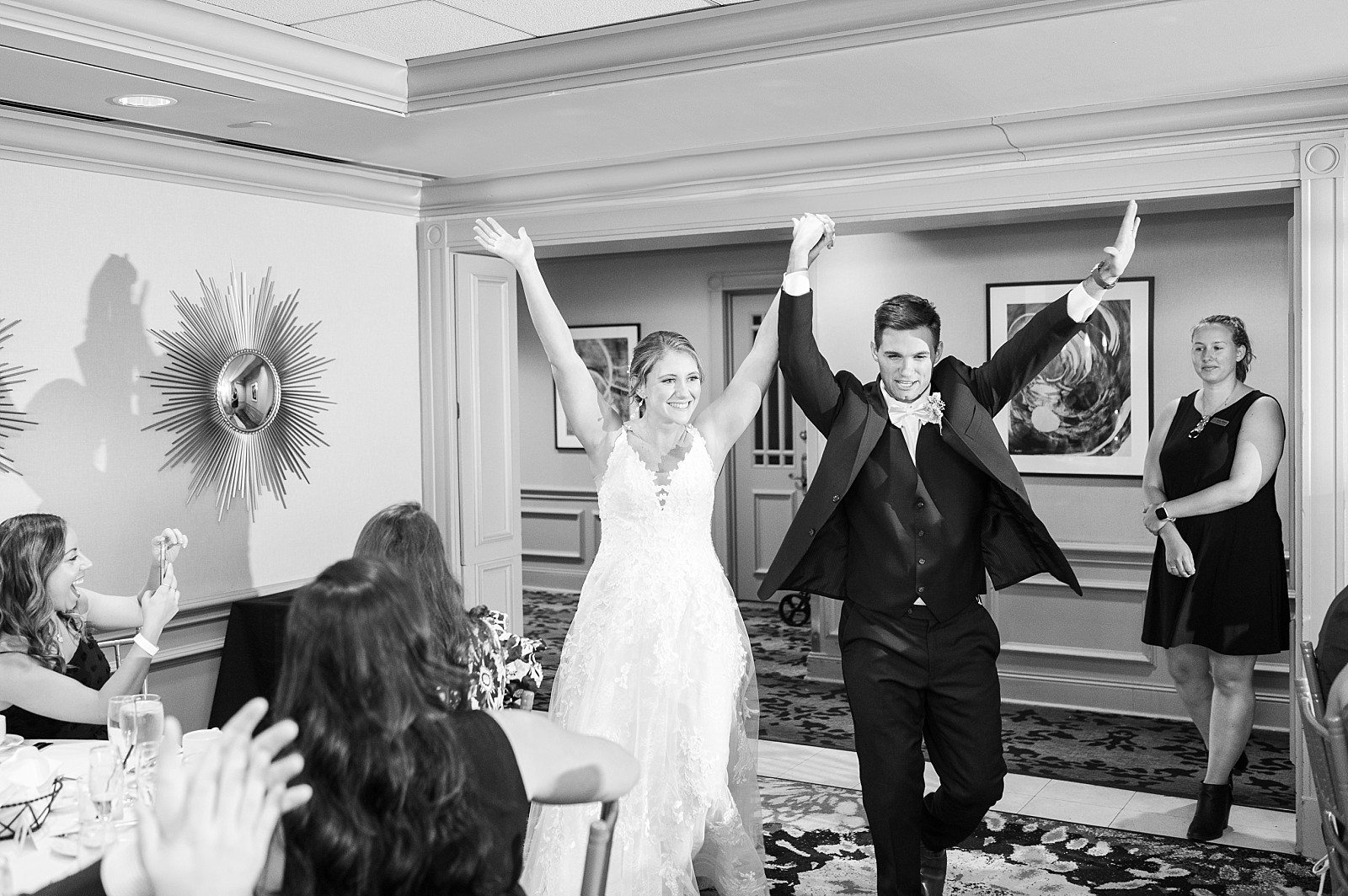 Bride and groom entering wedding reception | Raleigh Wedding Photographer Sarah Hinckley
