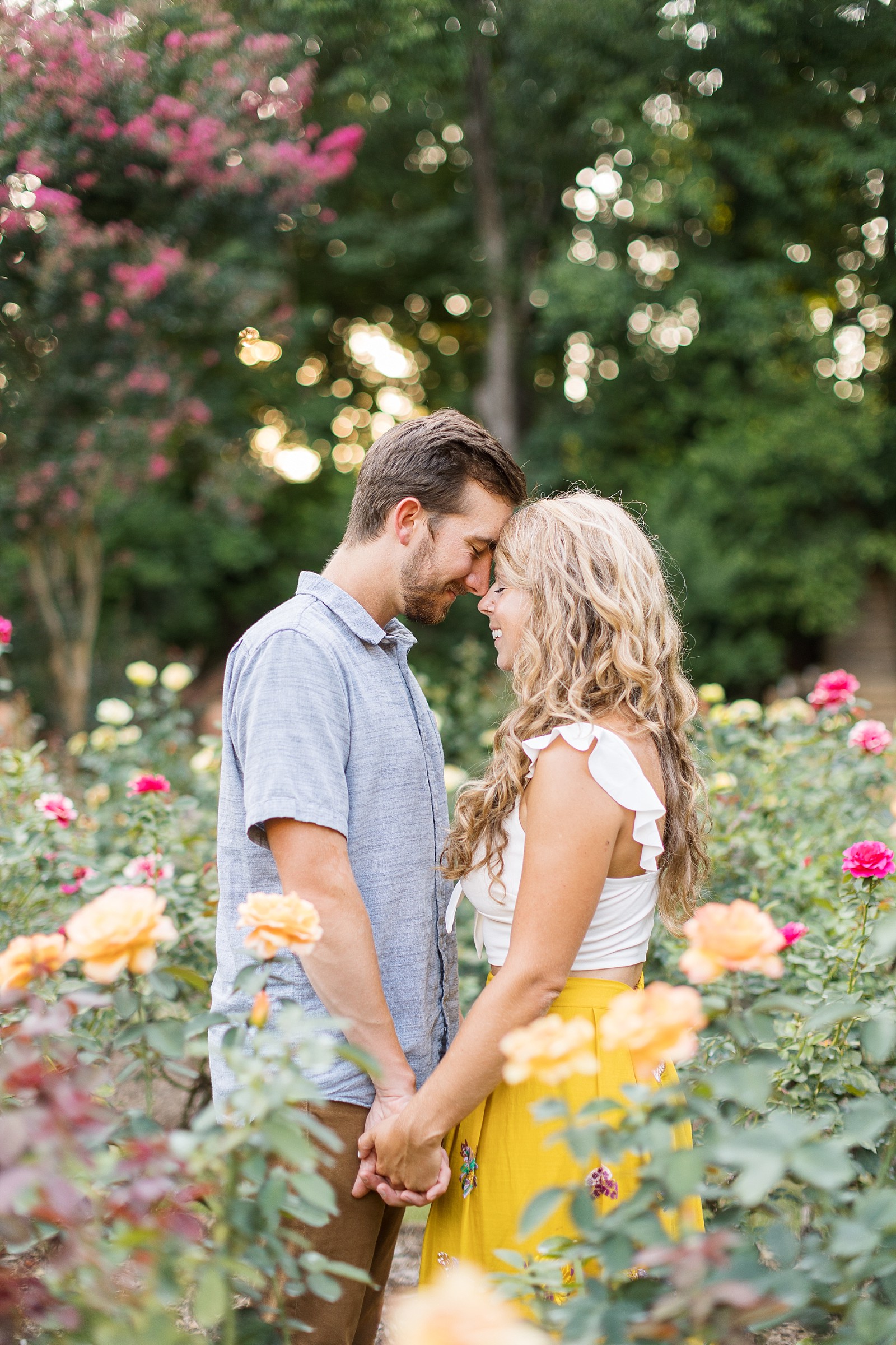 Photo session surrounded by roses | Raleigh Rose Garden Anniversary Photos | Raleigh Portrait Photographer | Raleigh NC Wedding Photographer
