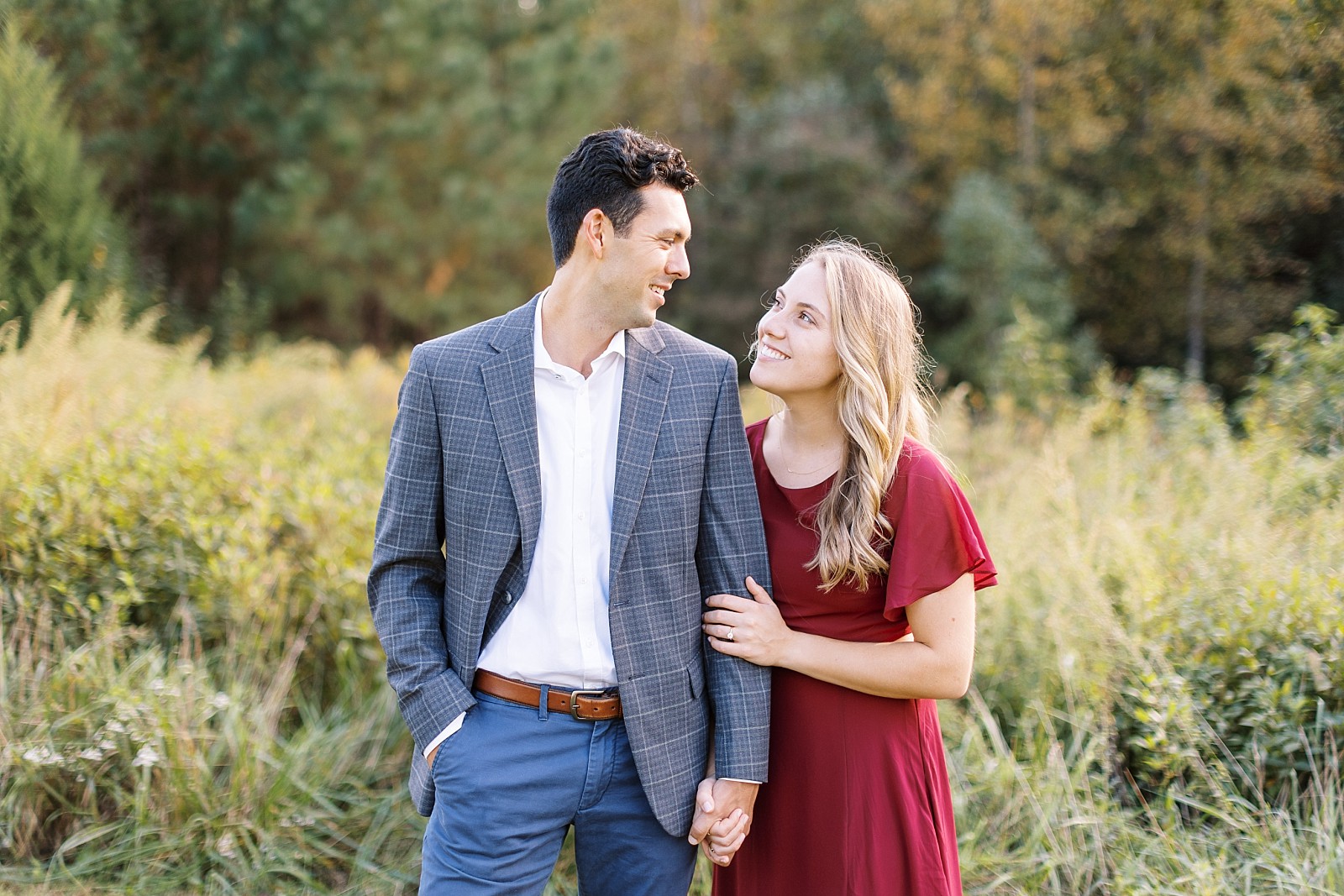 NC state College sweethearts during  fall engagement session | Raleigh NC wedding photographer