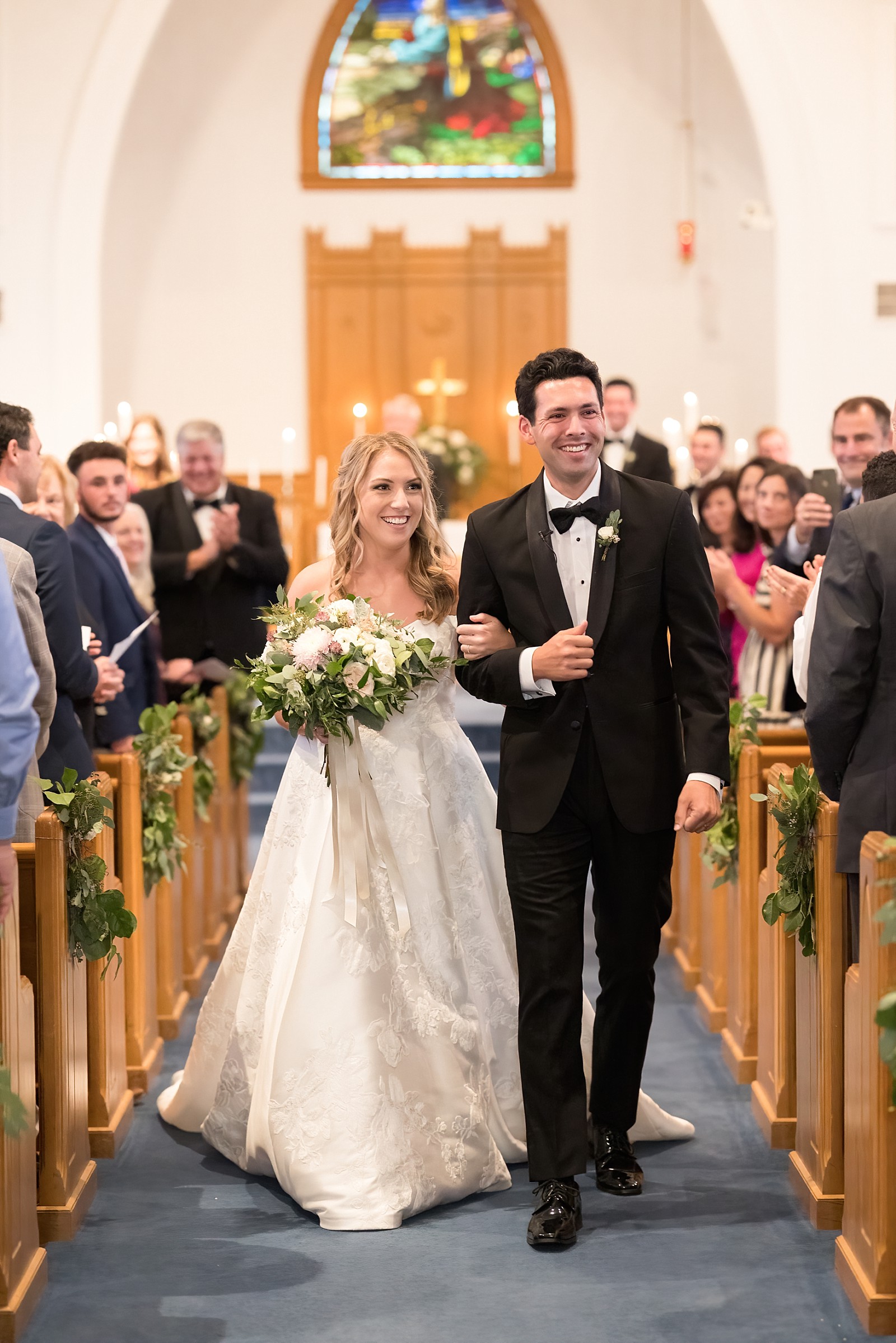 bride and groom walking down the aisle | NC Wedding Photographer 