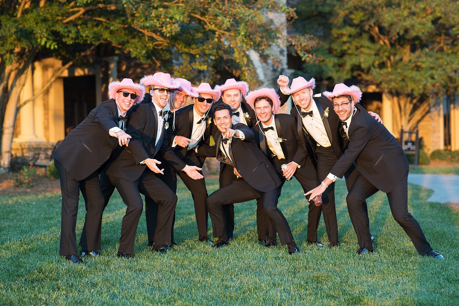 groomsmen in pink cowboy hats | winery wedding  | NC Wedding Photographer 