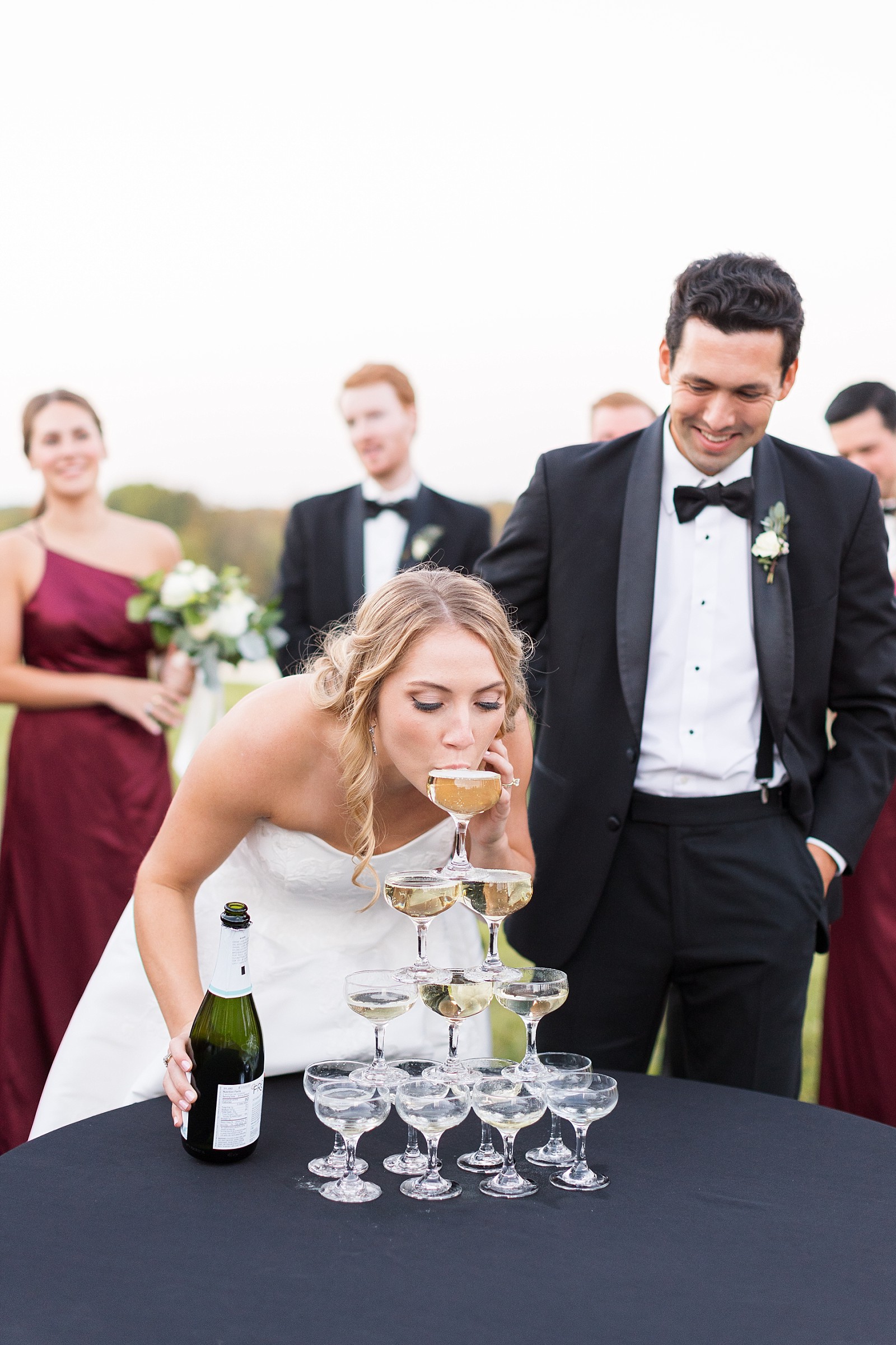 bride sipping champagne | Childress Vineyards Wedding | winery wedding |  | NC Wedding Photographer 