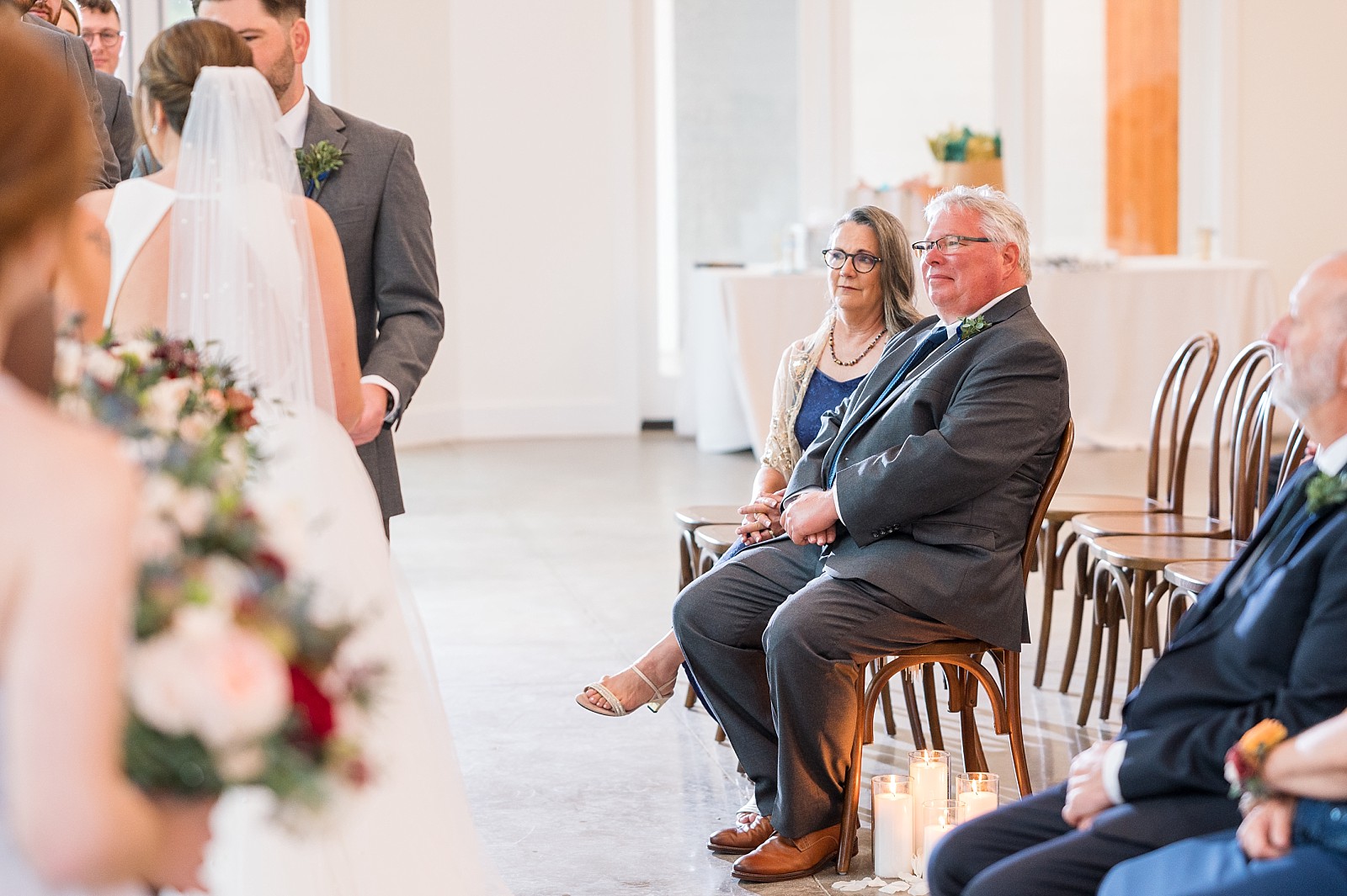 Mother and father of the groom during the ceremony | Raleigh NC Wedding Photography