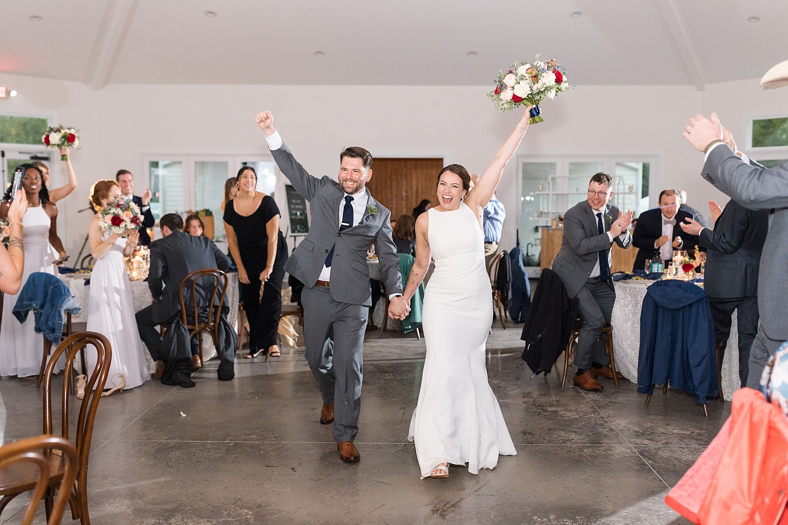 bride and groom entering reception at The Upchurch in Cary NC | Raleigh NC Wedding Photography | Sarah Hinckley Photography