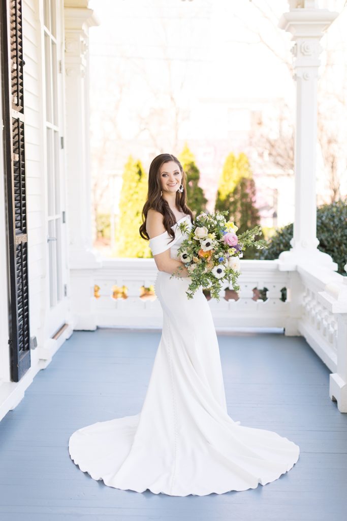 Bridal portrait on the porch of the Merrimon-Wynne House in Raleigh