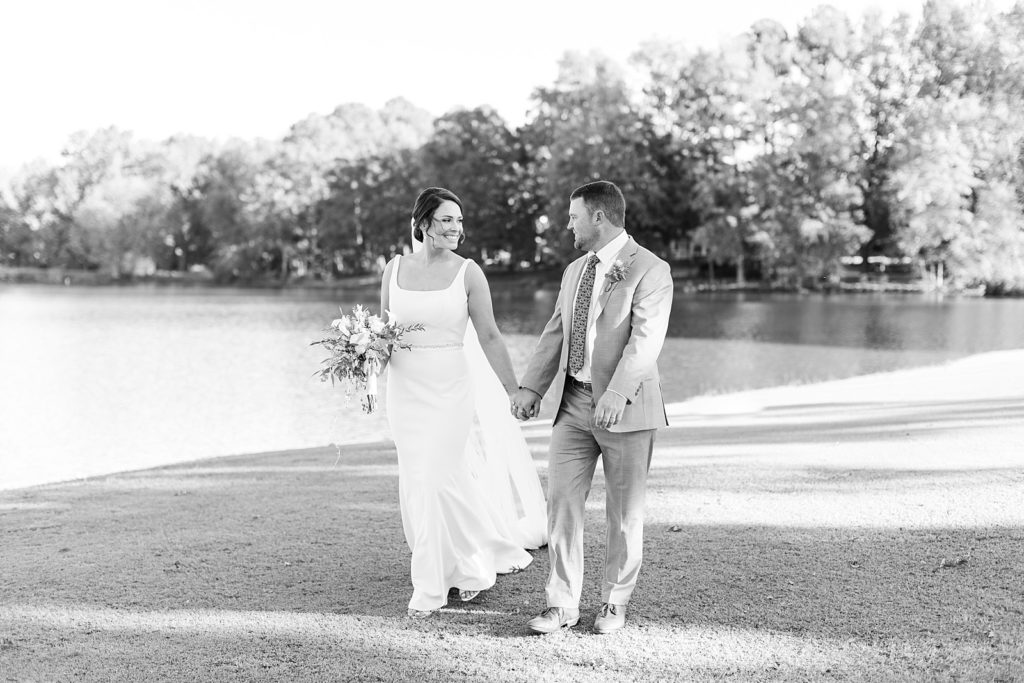 bride and groom walking hand in hand | Fall Wedding | Raleigh NC Wedding Photographer | Sarah Hinckley Photography