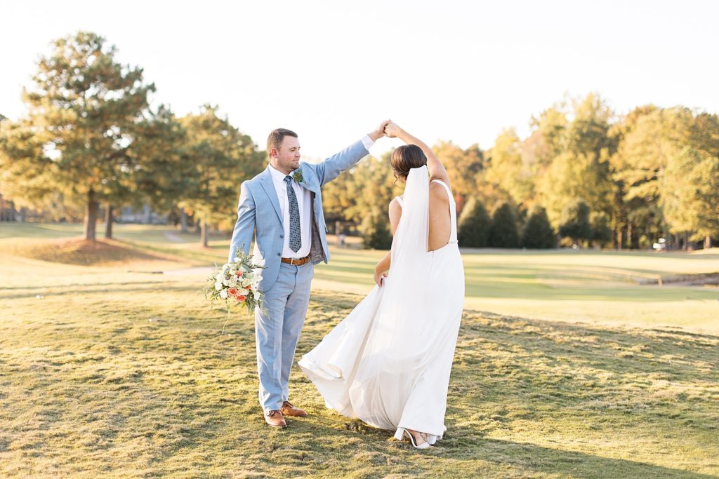 Groom twirling bride | Bentwinds Country Club Wedding | Fall Wedding | North Carolina Wedding | Raleigh NC Wedding Photographer | Sarah Hinckley Photography